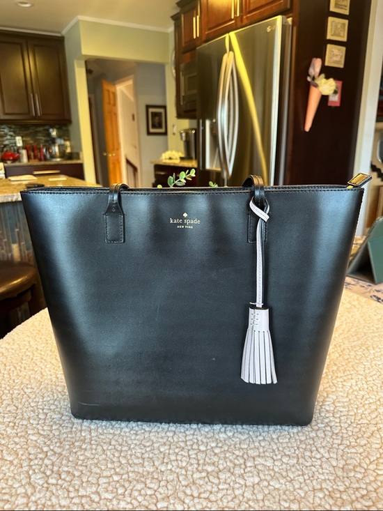 kate spade Handbags - Kate Spade Black Leather Tote with Contrast Pink Tassel
